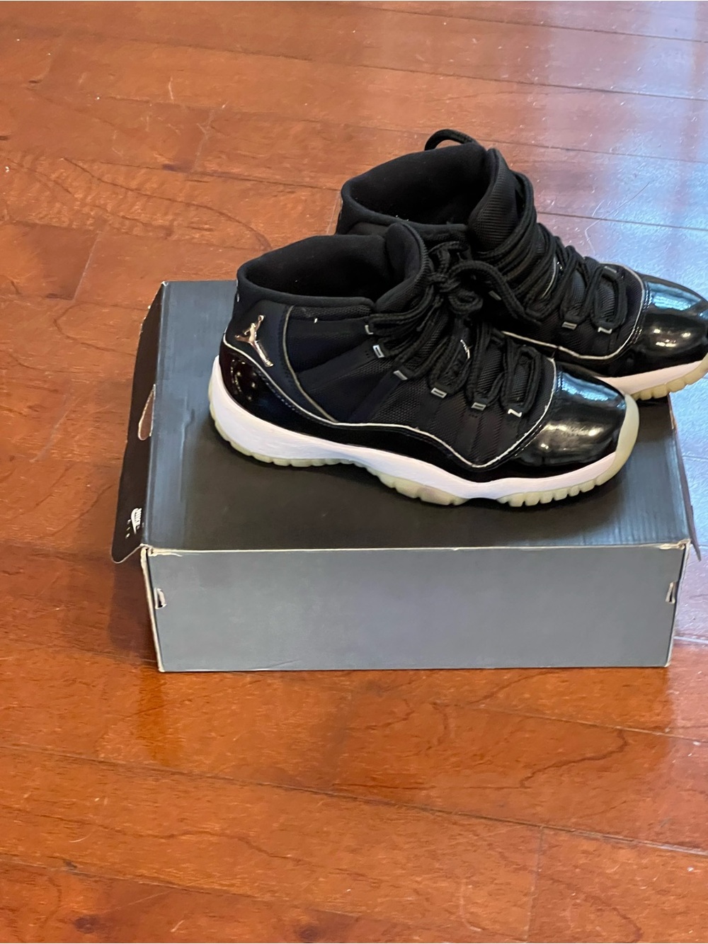 Jordan Kids Black and White High-Top Sneakers